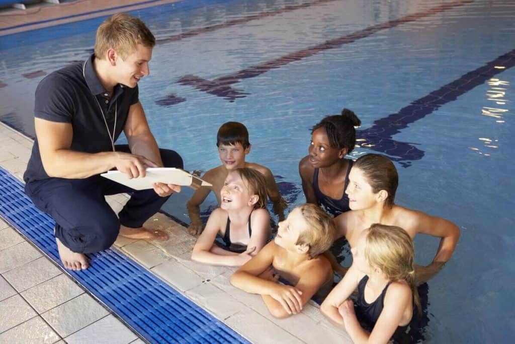 Image of kids swimming in a pool