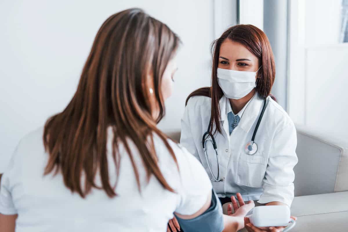 Practioner interviewing a patient 