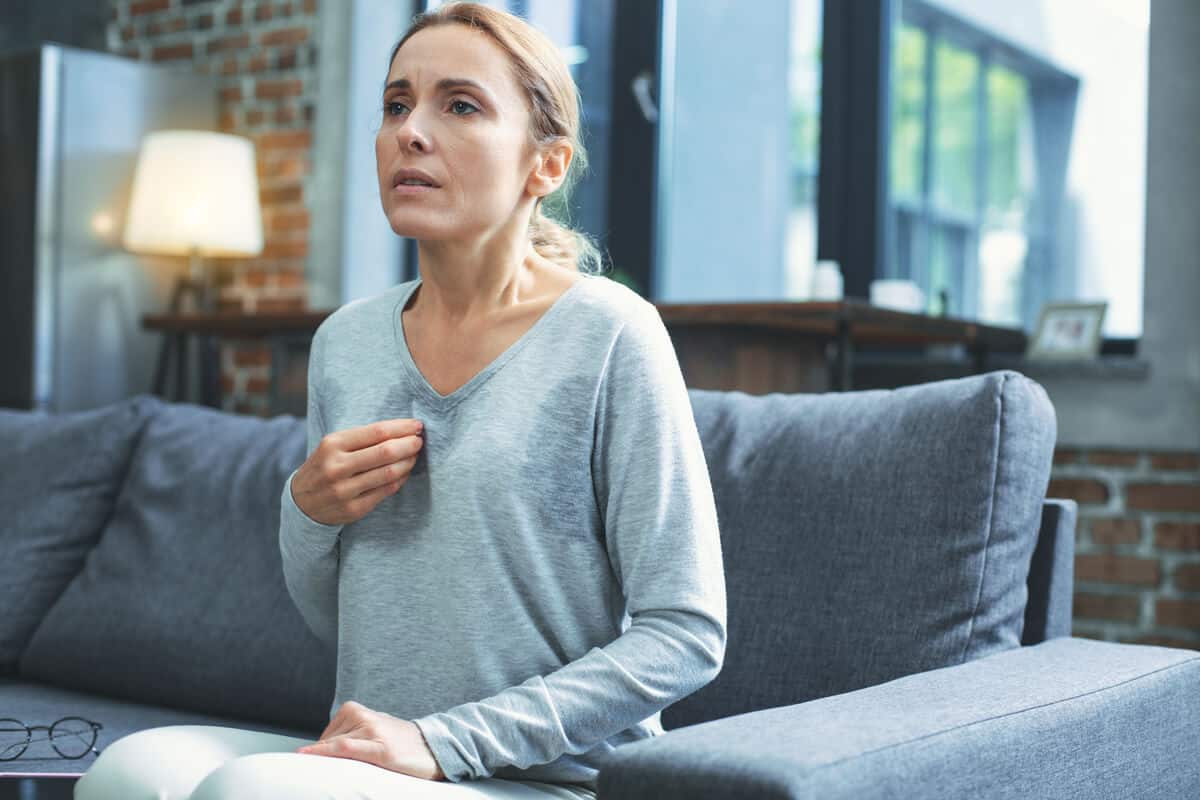 Woman experiencing a hot flash