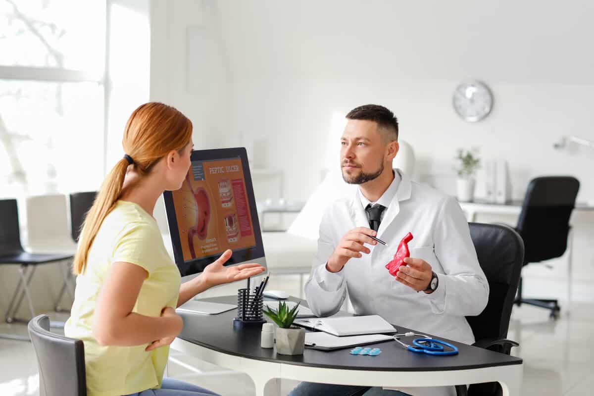 Practitioner consulting with a patient
