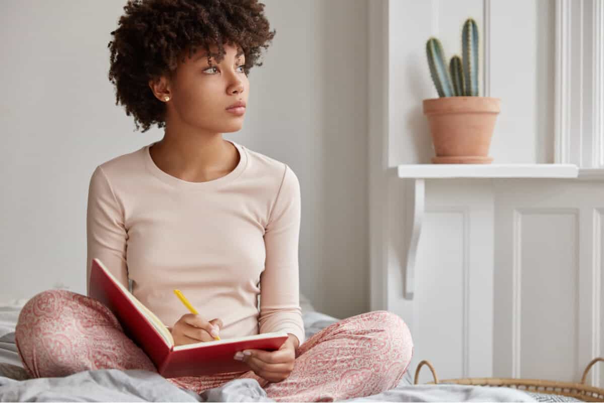 Mental resilience woman journaling