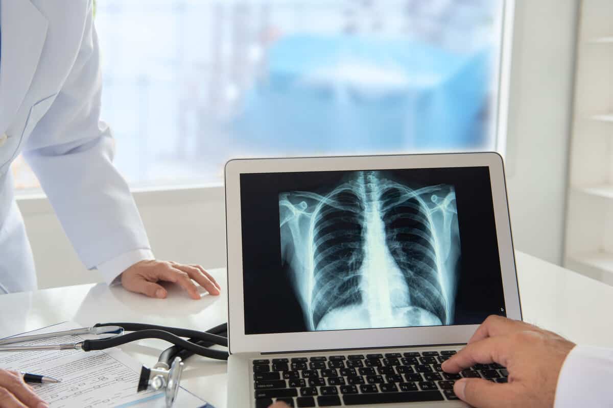 emerging technology in healthcare practitioner looking at an e ray on an ipad