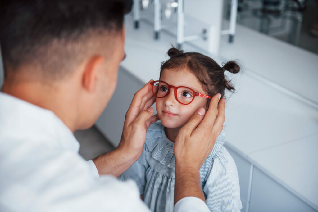 child with glasses