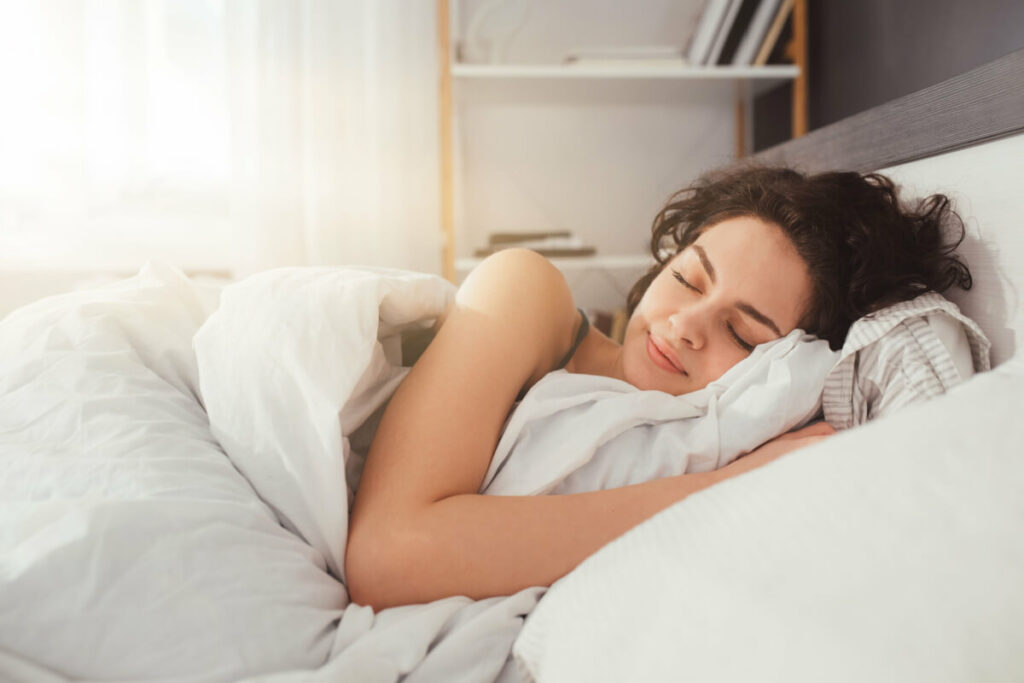 woman sleeping in bed