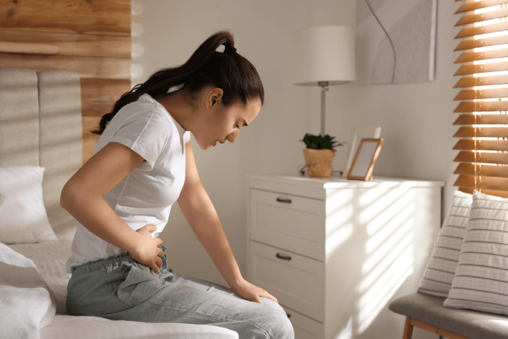 woman struggling with gut issues