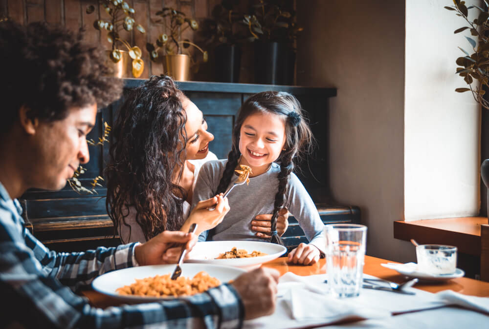 family eating at a dinner table